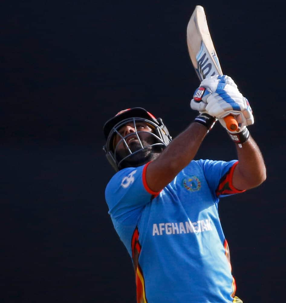 Afghanistan's Shahzad Mohammadi bats against South Africa during their ICC World Twenty20 2016 cricket match at the Wankhede stadium in Mumbai.