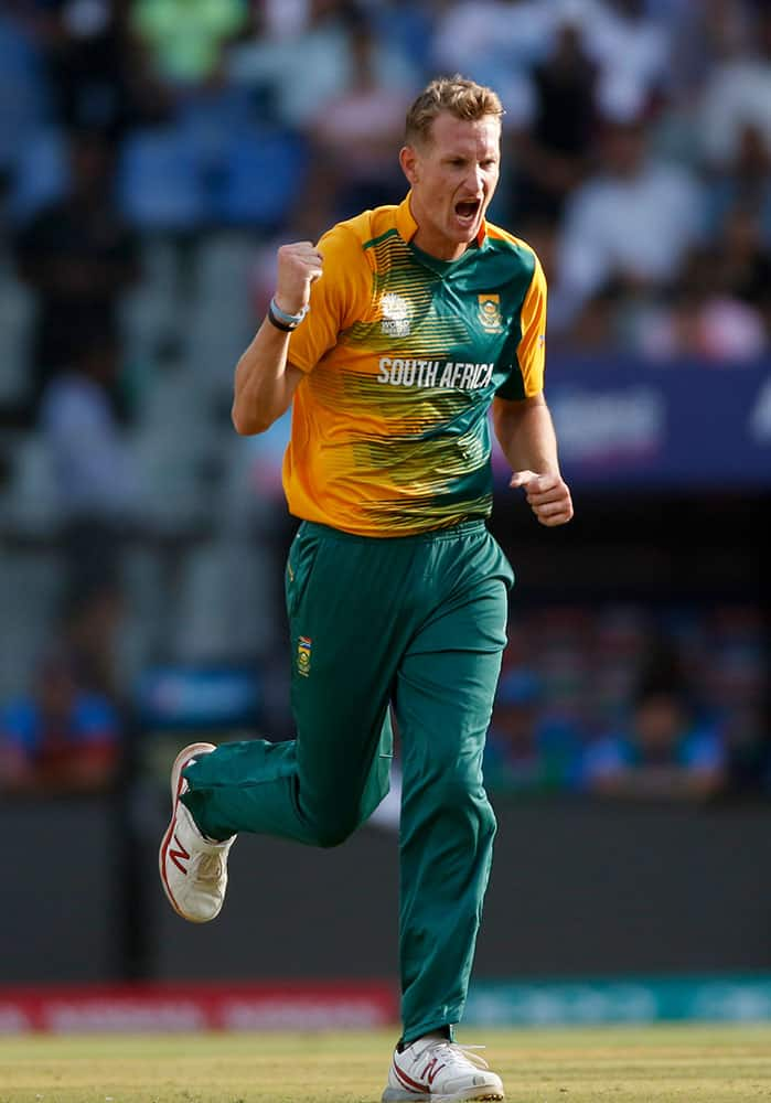 South Africa's Chris Morris celebrates the wicket of Afghanistan's Asghar Stanikzai during their ICC World Twenty20 2016 cricket match at the Wankhede stadium in Mumbai.