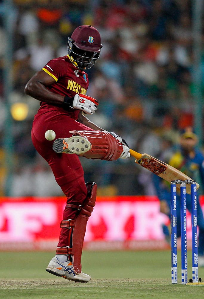 West Indies’ Andre Fletcher kicks away the ball to avoid getting out during their ICC World Twenty20 2016 cricket match against Sri Lanka in Bangalore.