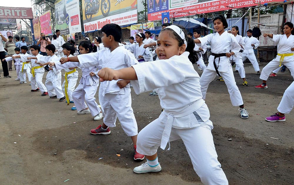 Kids showing their martial arts skills during the observance of Rahagiri Day or Vehicle free Day in Ranchi.