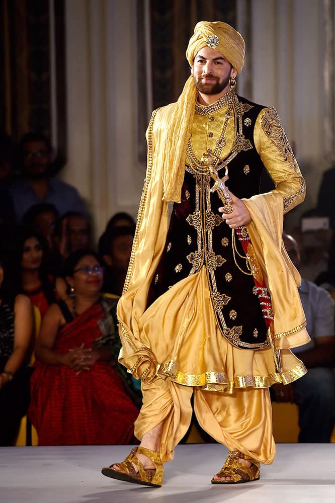 Actor Neil Nitin Mukesh walks the ramp during Fashion Premier Week.
