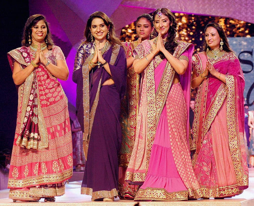 Bolywood actor Manisha Koirala and models display Designer Shaina NCs collection during a style fashion show for Cancer Patients Aid Association in Mumbai.