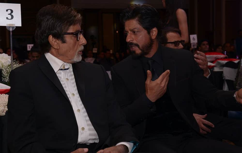 Amitabh Bachchan ‏:- T 2182 -A TOIFA, SRK and me discuss, then a day later at HT fashion award, we are still discussing .. bone pains !! -twitter