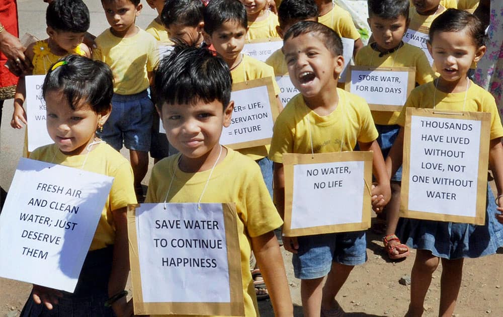 Children take part in a rally on the occasion of World Water Day in Karad.