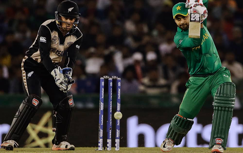 Pakistan's Ahmed Shehzad plays a shot during their ICC World Twenty20 2016 cricket match against New Zealand in Mohali.