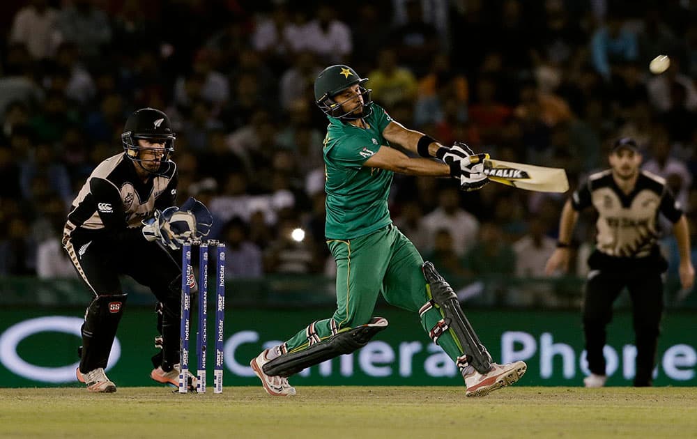 Pakistan's Shahid Afridi plays a shot during their ICC World Twenty20 2016 cricket match against New Zealand in Mohali.