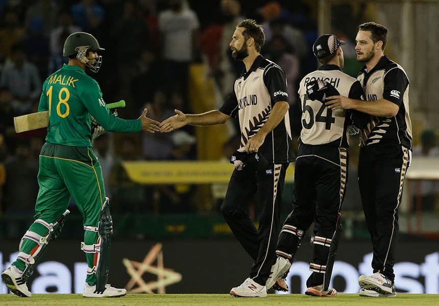 Pakistan's Shoiab Malik congratulates New Zealand players after they won their ICC World Twenty20 2016 cricket match in Mohali.