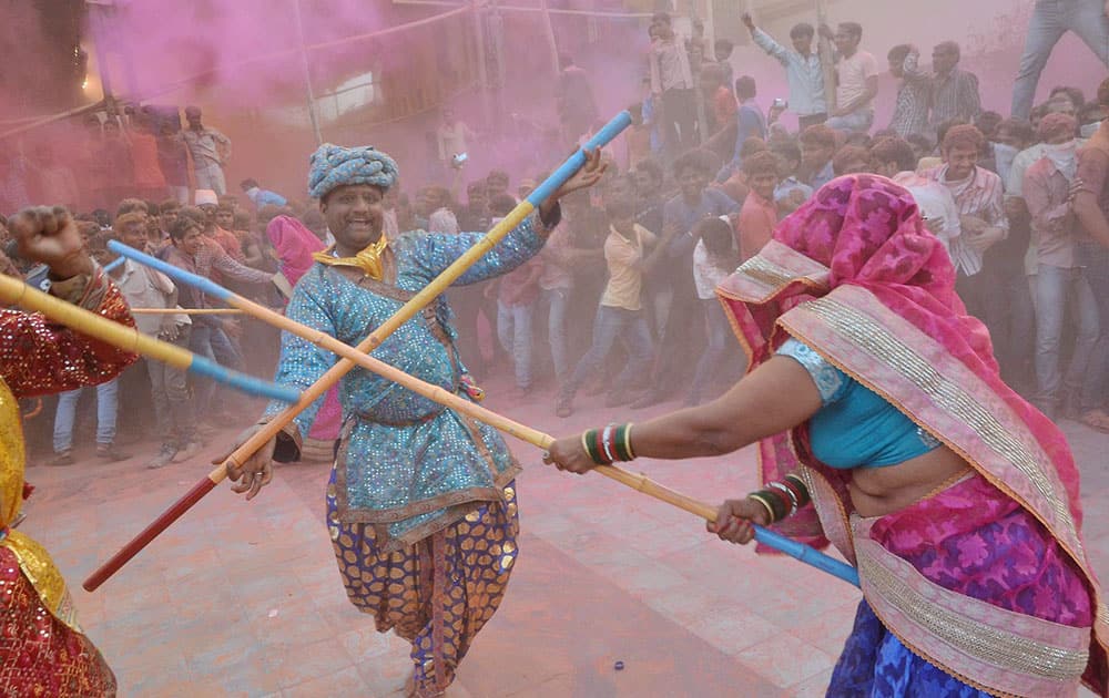  Devotees during Latthmaar Holi celebration at Sri Krishna Janamsthan in Mathura.