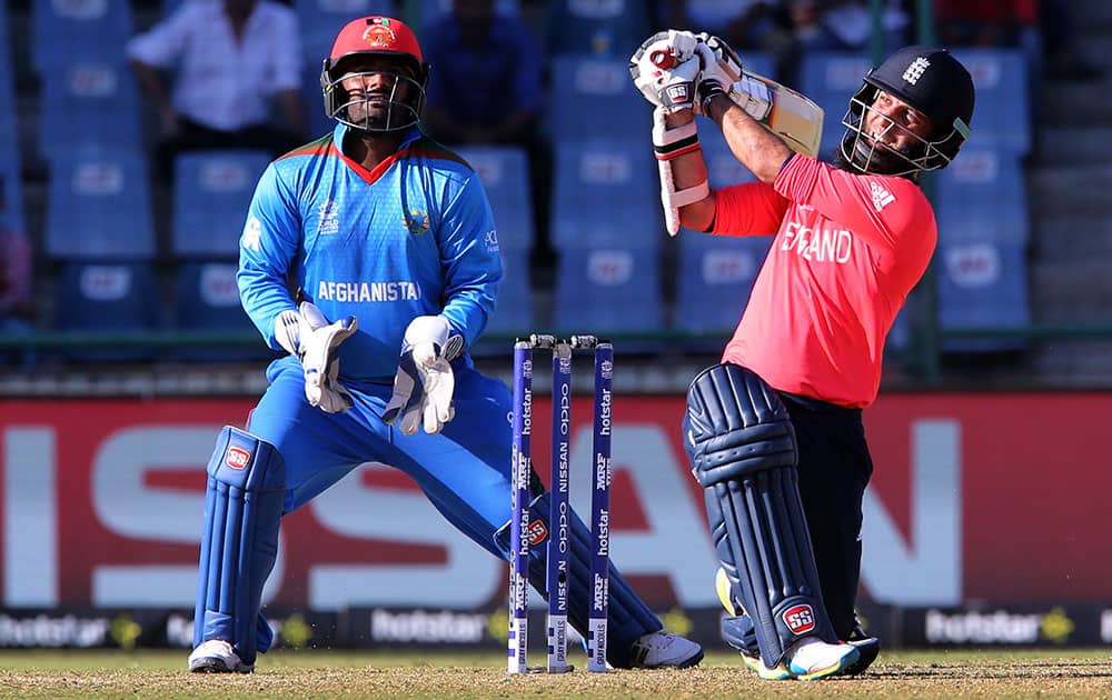 England's Moeen Ali plays a shot while playing against Afghanistan during their ICC Twenty20 2016 Cricket World Cup match at the Feroz Shah Kotla cricket stadium in New Delhi.