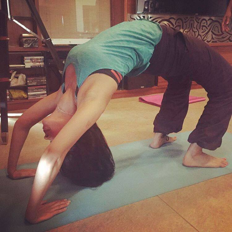 Mallika Sherawat ‏:- No break from yoga even on Holi:)! #yogabymallika #backbend #yogaeverydamnday #yoga #fitness… -instagram