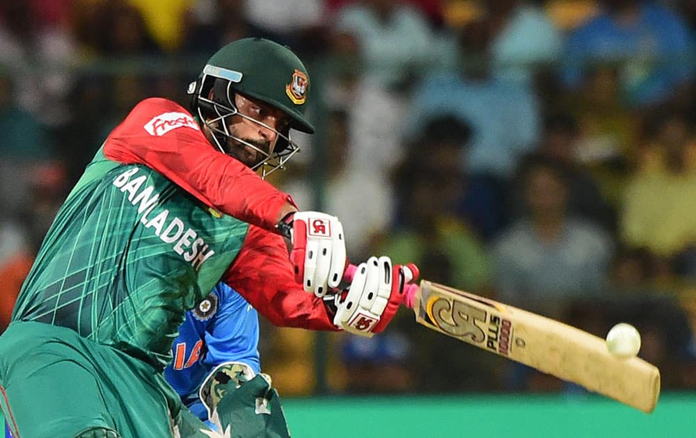 Bangladesh Tamim Iqbal plays a shot during the ICC World T20 match between India and Bangladesh at Chinnaswamy Stadium in Bengaluru.