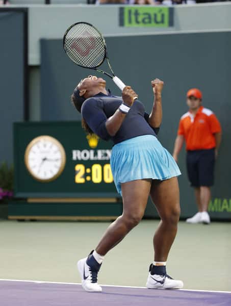 Serena Williams, of the United States, celebrates after winning a game against Christina McHale, also of the United States, at the Miami Open tennis tournament in Key Biscayne, Fla.