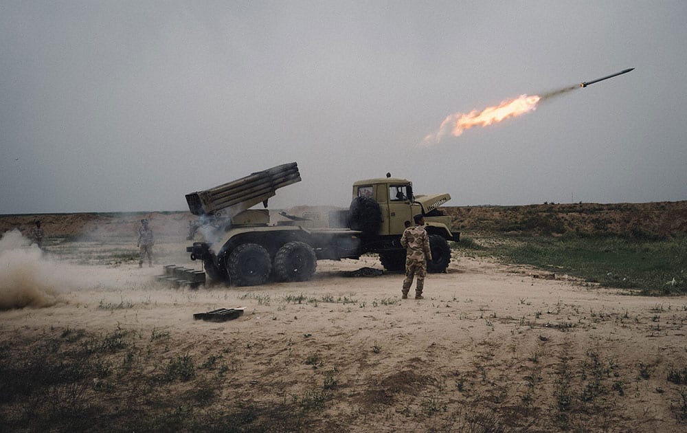 A rocket is fired from a rocket launcher outside Makhmour, about 75 km (47 miles) east of Mosul, Iraq.