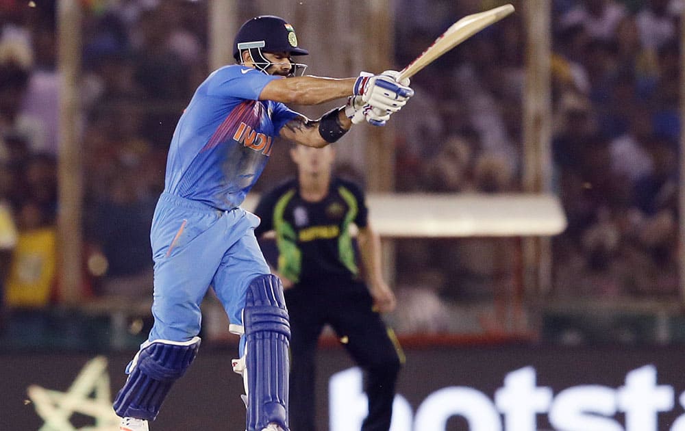 India's Virat Kohli bats during their ICC World Twenty20 2016 cricket match against Australia in Mohali.