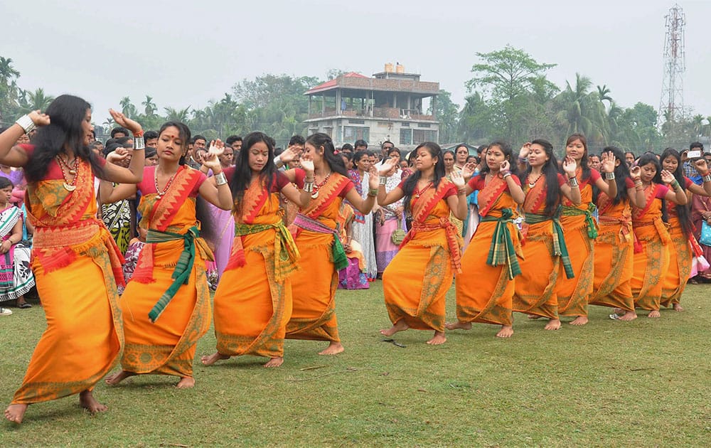 Tribal youth performing traditional Bodo dance during an election campaign of Mrinal Deka an Independent candidate of Rangiya constituency in Kamrup (Rural) district of Assam.