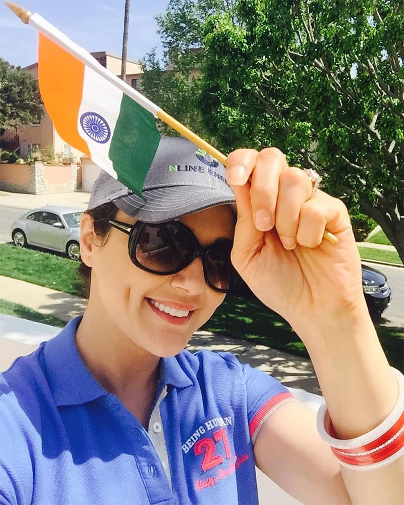 Preity zinta :- Stuck with my lucky blue T-shirt today after the rocking #IndvsAus cricket game It's sure… -instagram