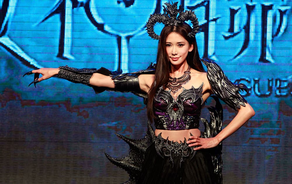 Taiwanese actress Chiling Lin poses for press during an event to promote the online game