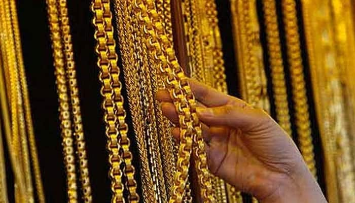 Gold, silver extend slide on weak global cues, tepid demand