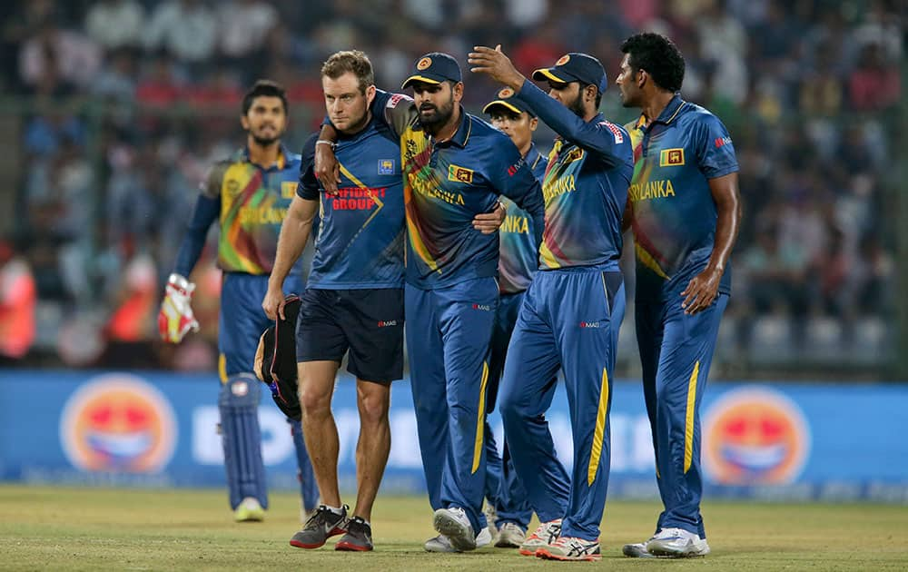 Sri Lanka's Lahiru Thirimanne is injured during their ICC Twenty20 2016 Cricket World Cup match against South Africa at the Feroz Shah Kotla Cricket Stadium in New Delhi.