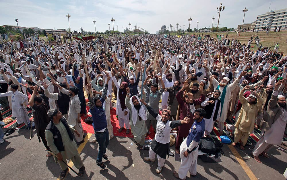 Protesters from Pakistan's Sunni Tehreek group chant slogans during a sit-in near the parliament building in Islamabad, Pakistan.