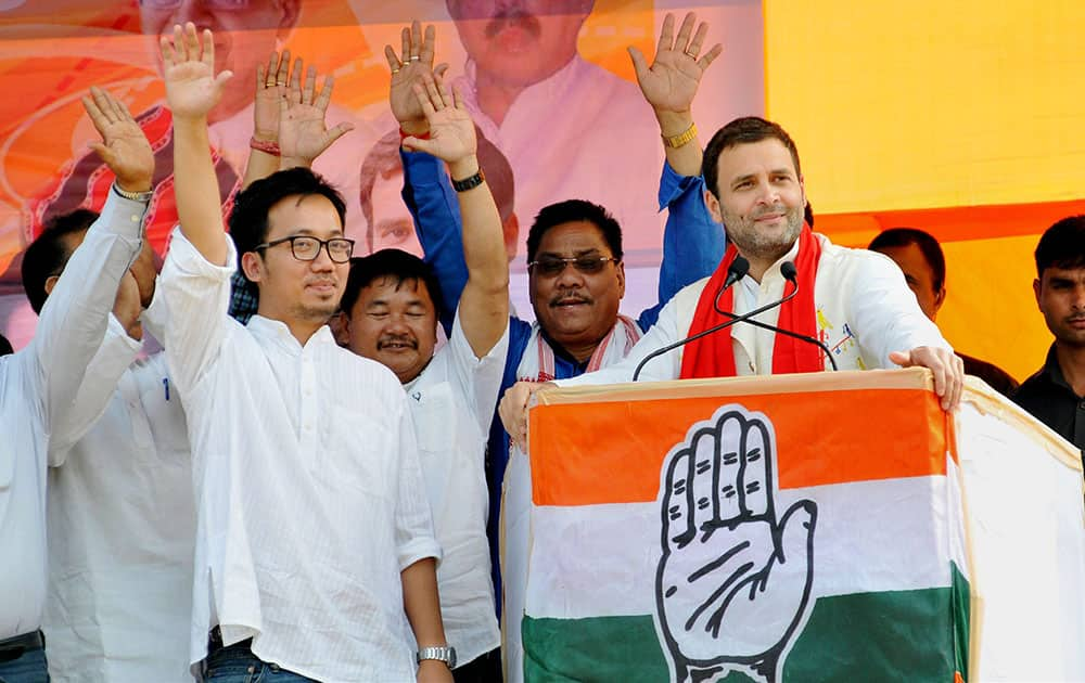 Congress Vice President Rahul Gandhi with party candidates at an election rally at Kasa Stadium in Diphu, Assam.