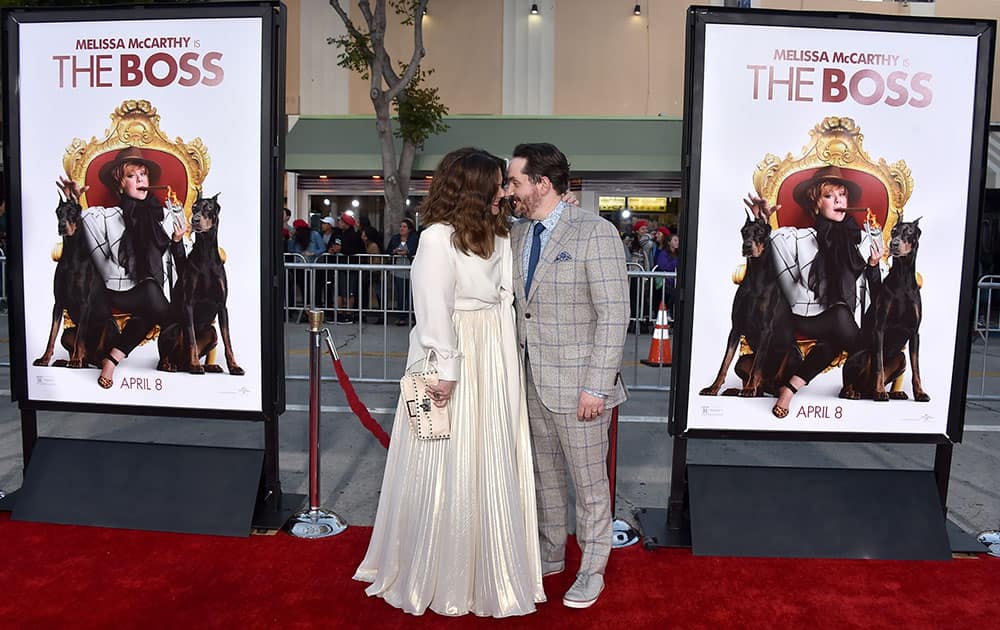 Melissa McCarthy, left, and Ben Falcone arrive at the world premiere of 