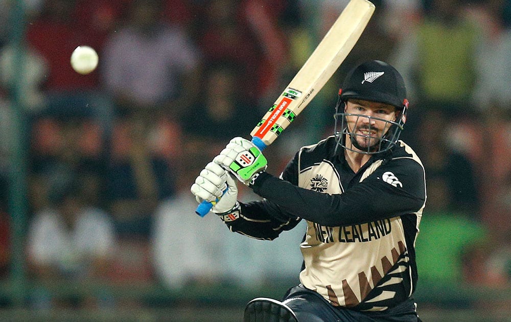 New Zealand's Colin Munro bats during their ICC World Twenty20 Cricket World Cup semifinal match against England at the Feroz Shah Kotla cricket stadium in New Delhi.