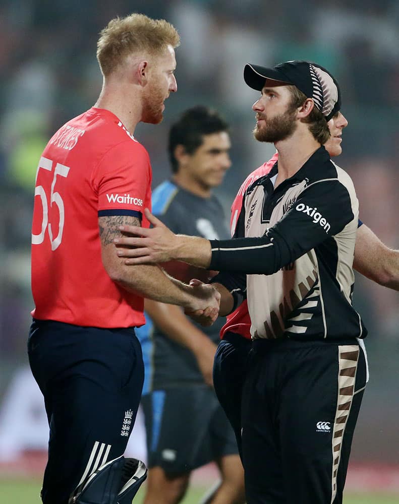 England's Ben Stokes, left, shakes hands with New Zealand's Kane Williamson after their ICC Twenty20 2016 Cricket World Cup semifinal match at the Feroz Shah Kotla Cricket Stadium in New Delhi.