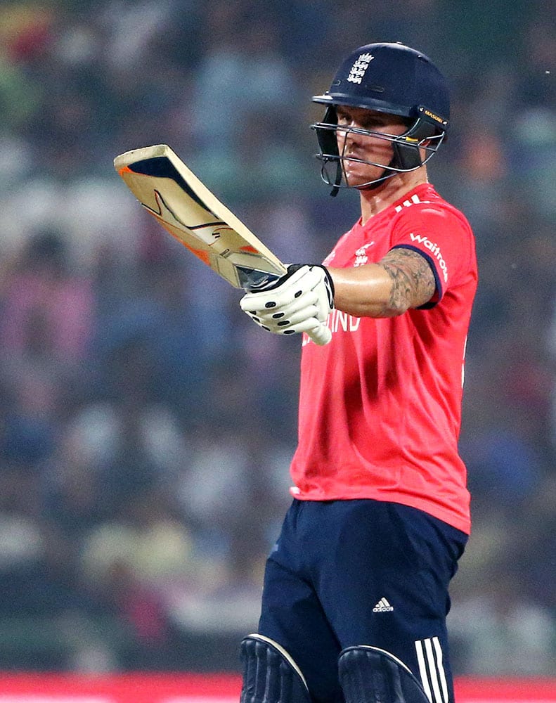 England's Jason Roy waves his bat after getting 50 runs during their ICC Twenty20 2016 Cricket World Cup semifinal match against New Zealand at the Feroz Shah Kotla Cricket Stadium in New Delhi.