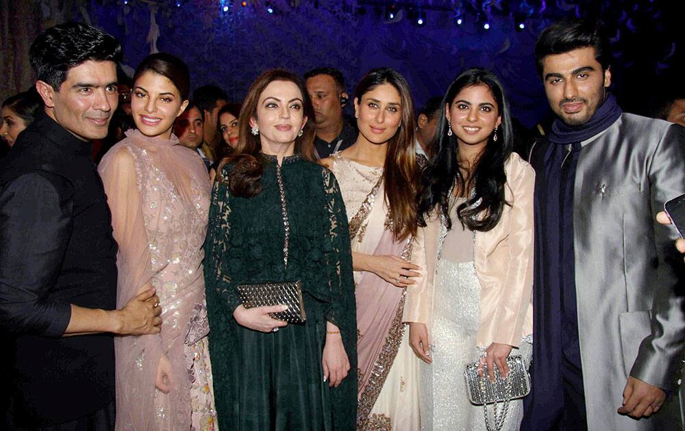Fashion designer Manish Malhotra with actors Arjun Kapoor, Kareena Kapoor and Jacqueline Fernandez, Nita Ambani and her Isha Ambani during the opening show of Lakme Fashion Week in Mumbai.