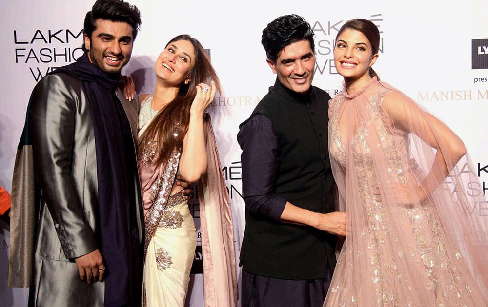 Fashion designer Manish Malhotra with actors Arjun Kapoor, Kareena Kapoor and Jacqueline Fernandez during the opening show of Lakme Fashion Week in Mumbai.