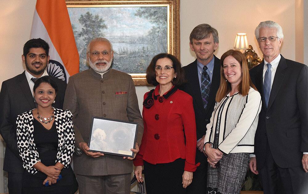 Prime Minister Narendra Modi poses with a group of Scientists including some of Indian origin from Laser Interferometer Gravitational Wave Observatory (LIGO) after their bilateral meeting in Washington.