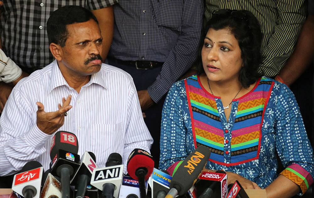 K Panduranga Rao, left, group head of human resources and administration, and Sita, legal head of IVRCL, the company that was constructing the underpass in Kolkata.
