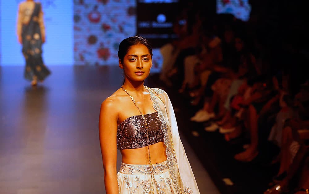 A model displays a creation by Indian designer Payal Singhal during the Lakme Fashion Week in Mumbai