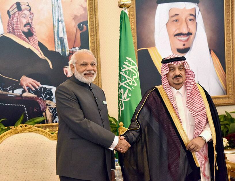 Prime Minister Narendra Modi being received by the Governor of Riyadh, Faisal bin Bandar bin Abdulaziz Al Saud on his arrival, in Royal Terminal, Riyadh.