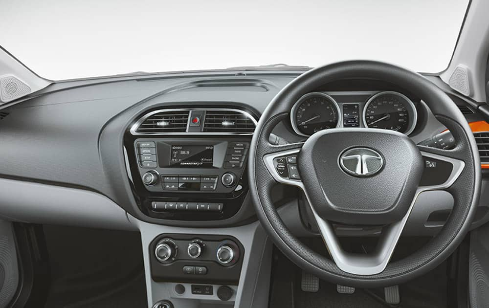 Dual tone interior, customizable air vents and premlum graphics on fabric. (Pic courtesy: http://madeofgreat.tatamotors.com/tiago/)