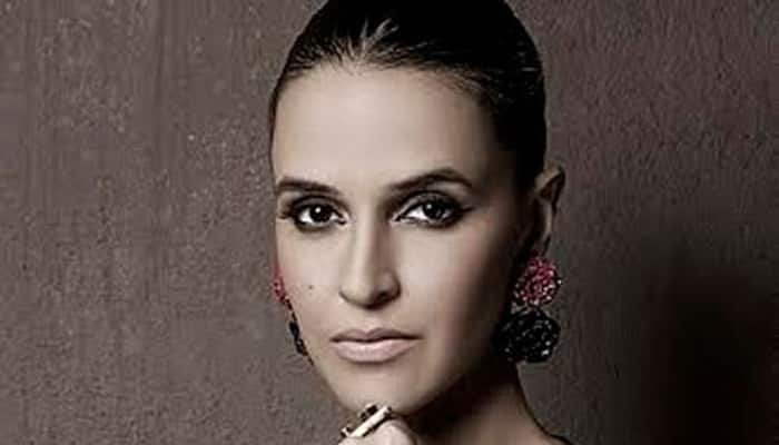 I am a full time struggler: Neha Dhupia