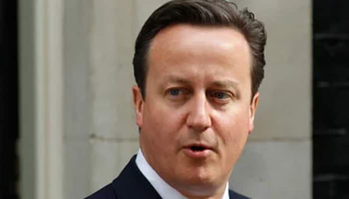 British PM David Cameron admits he profited from father`s offshore fund