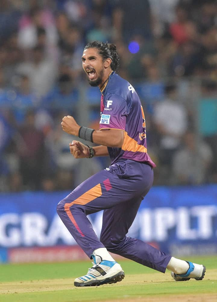 Rising Pune Supergiantss Ishant Sharma celebrates the wicket of Mumbai Indianss batsman Rohit Sharma during the IPL 2016 in Mumbai.