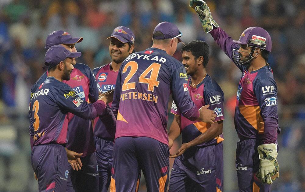 Rising Pune Supergiantss players celebrates the wicket of Mumbai Indianss Shreyash Gopal during the IPL 2016 opening match played in Mumbai.