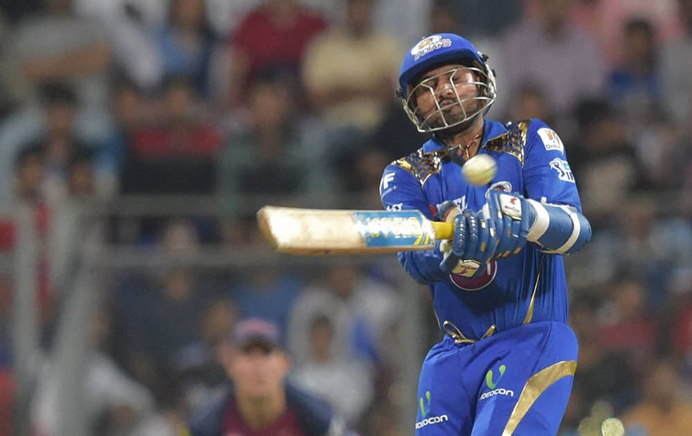 Mumbai Indians batsman Harbhajan Singh plays a shot during the IPL 2016 opening match played against Rising Pune Supergiants in Mumbai.