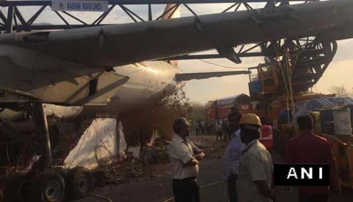 Watch: Crane carrying defunct Air India aircraft collapses near airport