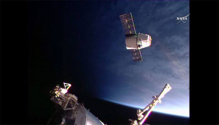 SpaceX cargo arrives at crowded space station
