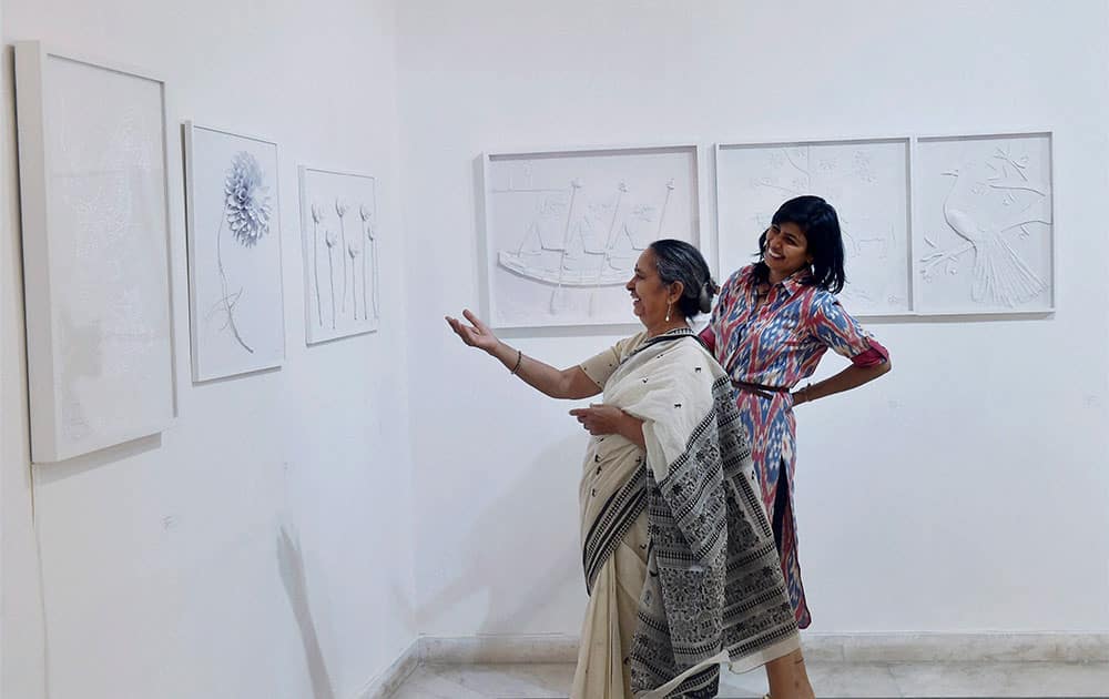 Delhi-based artist Sukanya Garg with eminent artist Shobha Broota at an experimental group art show White on White displayed at the NIV Art Centre in New Delhi. 