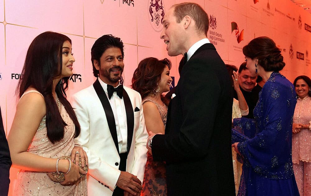 Prince William, Duke of Cambridge and Catherine, Duchess of Cambridge meeting actors Aishwarya Rai Bachchan and Shahrukh Khan during the Bollywood theme dinner in Mumbai.