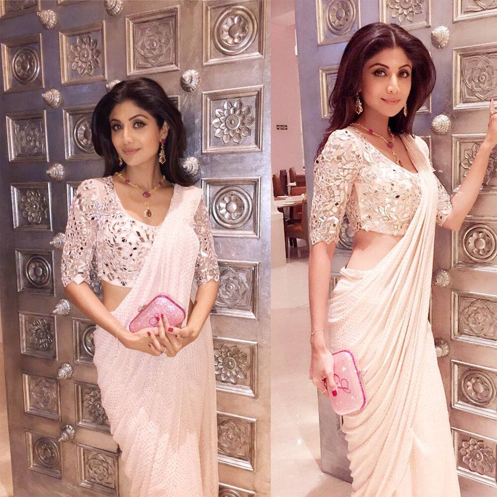 SHILPA SHETTY KUNDRA :- Landed nd dressed in 7 mins... En Route to the #kensingtonroyal dinner now.Wearing @monishajaising with @farahkhanali -twitter