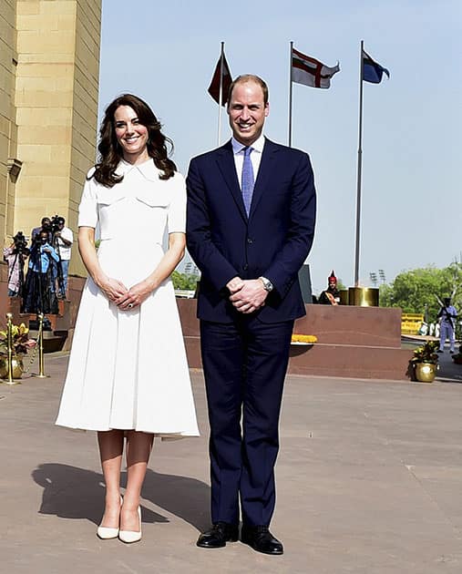 Britains Prince William and his wife, Kate Middleton, the Duchess of Cambridge pose at India Gate in New Delhi.