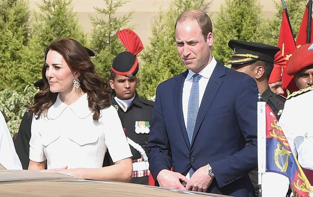 Britains Prince William and his wife Kate Middleton, the Duchess of Cambridge during their visit at India Gate in New Delhi.