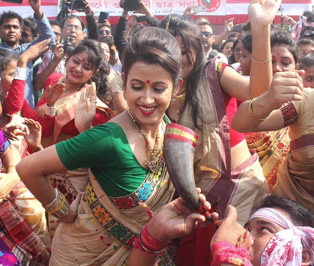 Assamese film actors perform during the celebrations of Rongali Bihu festival in Gawahati.