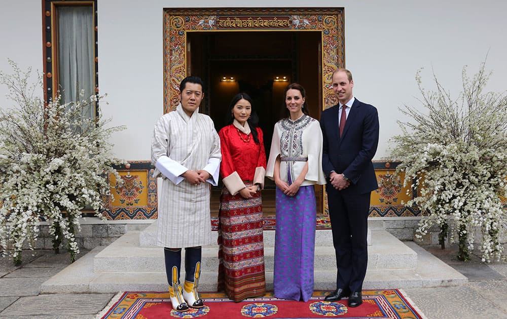 This photo provided by Royal Kingdom of Bhutan, from left to right, Bhutan's King Jigme Khesar Namgyel Wangchuk, Bhutan's Queen, Jetsun Pema, Kate, Duchess of Cambridge and Britain's Prince William pose for a photograph in Thimphu, Bhutan.